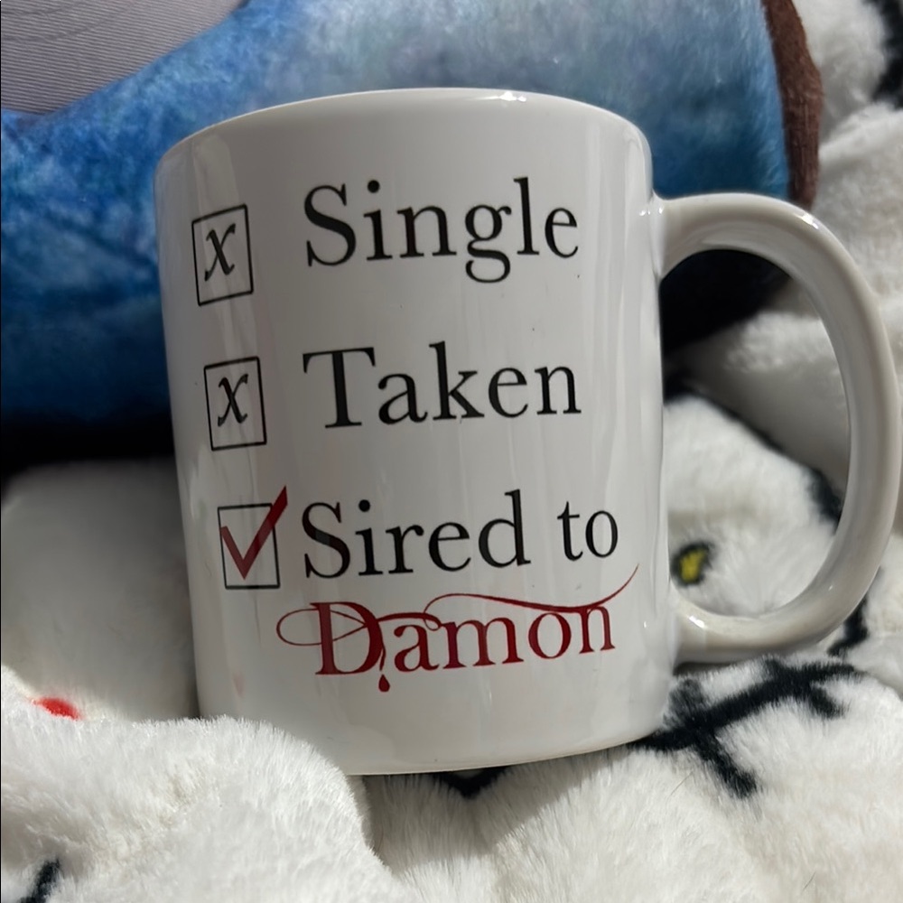White Ceramic Mug with Red and Black Text